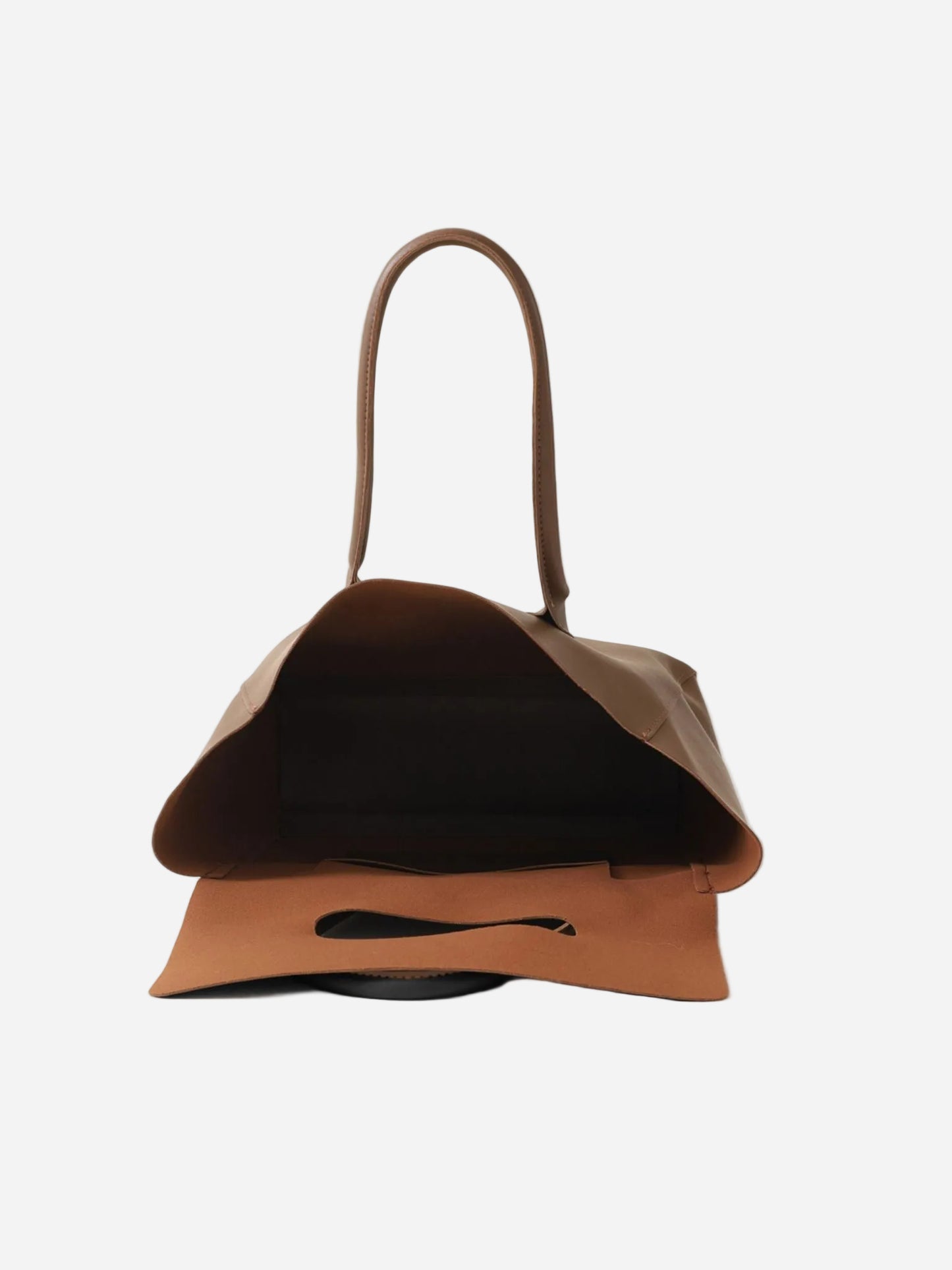 Brown leather handbag on a white background
