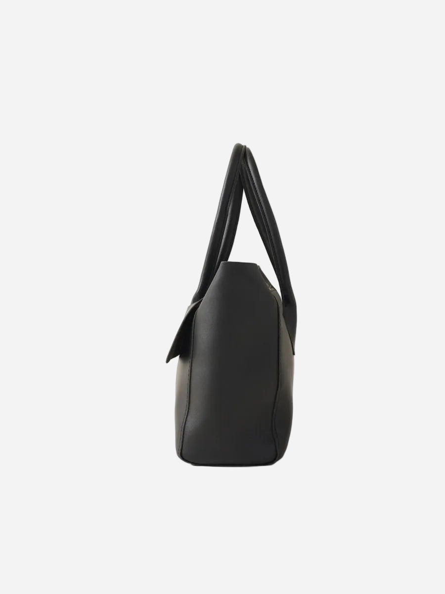 Black handbag on a white background
